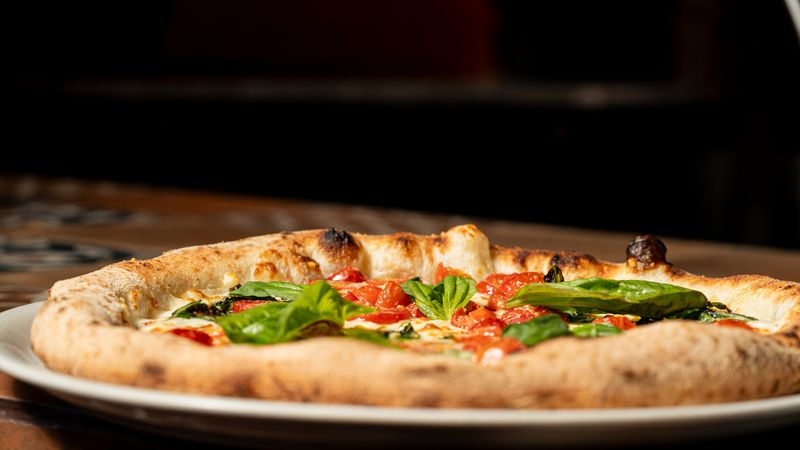 King Arthur's Supreme round table pizza with pepperoni and vegetables