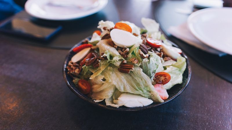 Colorful garden fresh salad with mixed greens and vegetables