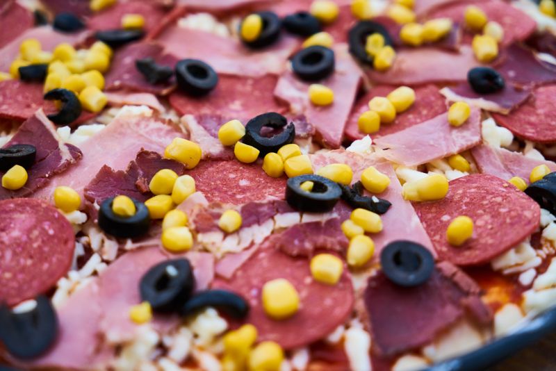 Meat Lovers pizza loaded with multiple meat toppings