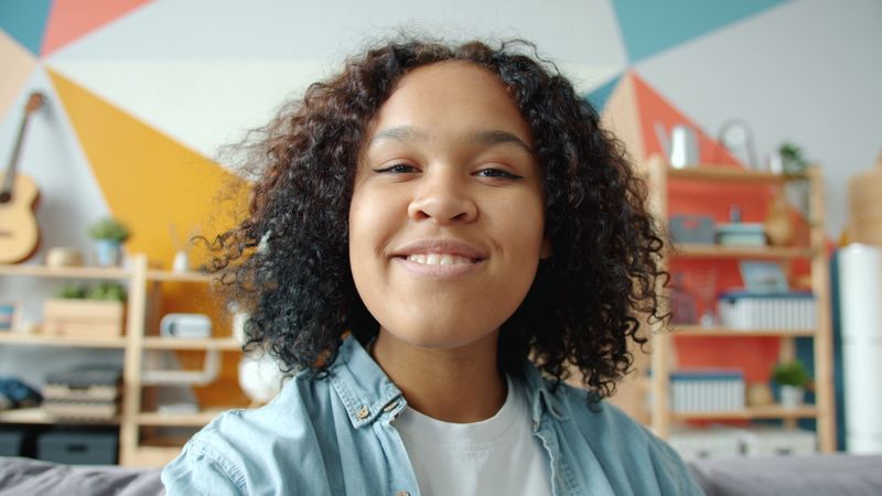 Round table pizza team member smiling